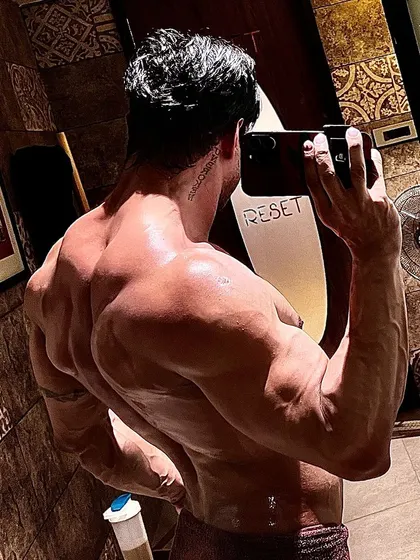 A final back shot, showing the sculpted physique that comes from an uncommon mindset.