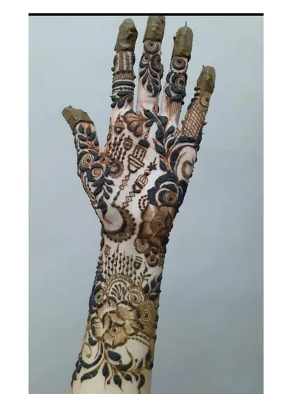 A unique Eid-themed design, featuring a crescent moon and lantern motifs mixed with traditional patterns.