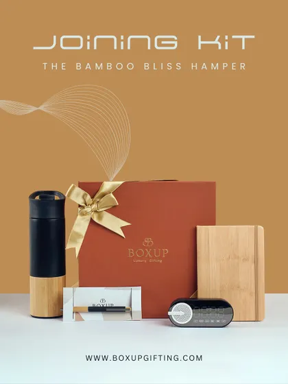 Introducing the Bamboo Bliss Hamper, a perfect employee joining kit for the eco-conscious workplace. This set includes a bamboo-finish tumbler, a bamboo notebook, and a digital clock, blending sustainability with modern functionality.