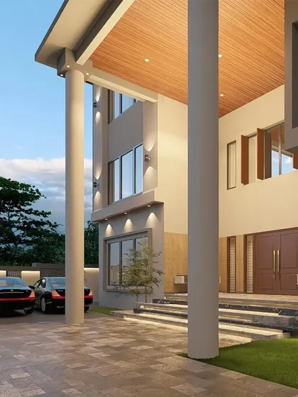 The entrance of 'The Honest House' is designed to be imposing yet welcoming. The double-height columns and wide steps lead to the main door, with a serene Buddha statue greeting visitors.