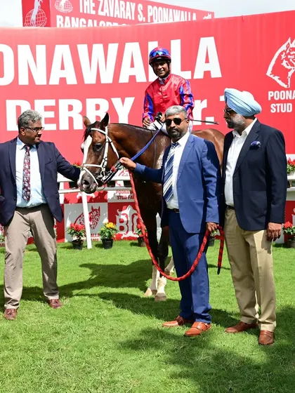 Prana, winner of The Amokbash B.T.C. Anniversary Cup, with jockey Suraj Narredu and the winning team.