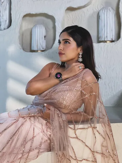 Another angle of Bhumi's pink saree, showing the beautiful geometric sequin pattern and how it drapes.