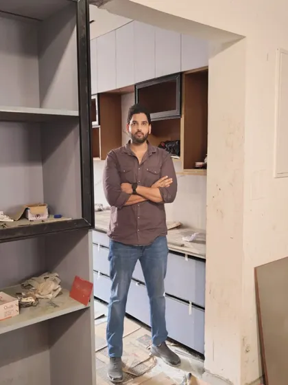 A candid moment on site. I make it a point to personally supervise the progress of every project to ensure my design vision is being executed perfectly.