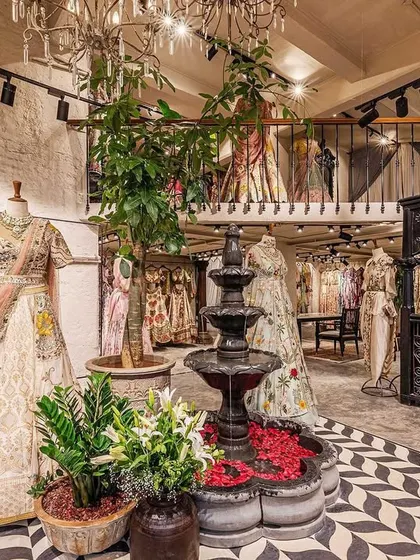 This wider view showcases the full scope of the spatial transformation, including the mezzanine level. Our design created a dynamic, multi-layered retail experience within the 1400 sq.ft. space, balancing open areas with more intimate corners for browsing.