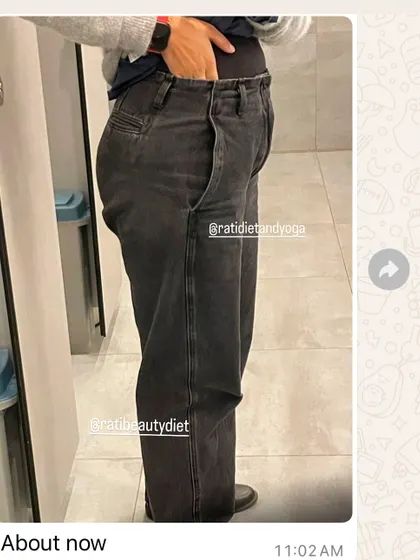 Nikita's "after" photo, showing how comfortably the jeans fit now.
