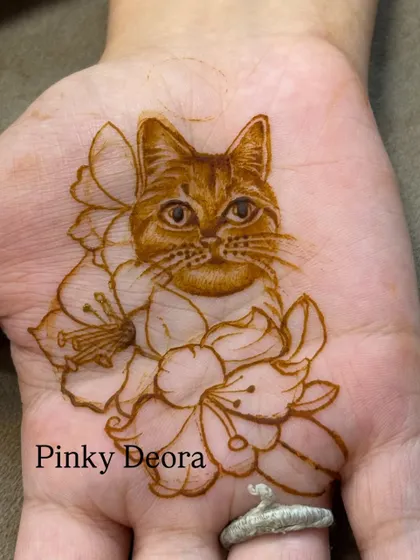 A beautiful portrait of a cat surrounded by flowers. This design is for all the cat lovers out there who appreciate the attitude and grace of our feline friends.