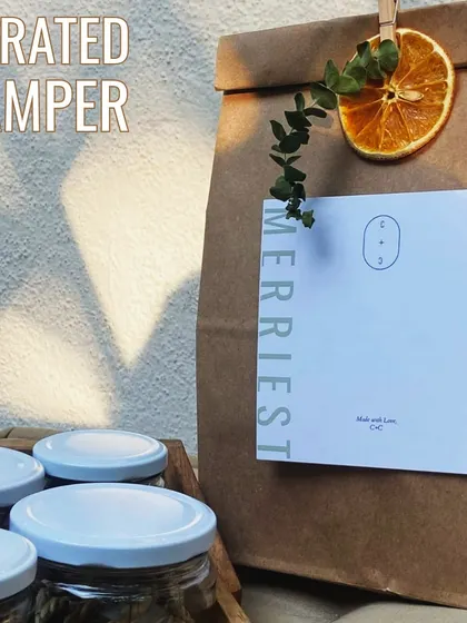 A close-up of our curated Christmas hamper bag. The simple, elegant packaging is designed to let the thoughtful gifts inside shine.