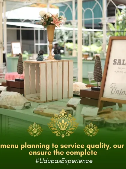From menu planning to service quality, our chefs ensure the complete Udupas Experience. This image shows our fresh salad bar, elegantly presented with rustic wooden crates and clear signage.