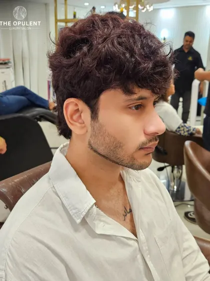 A side profile of the deep burgundy color, showing how it catches the light. This is a great way for men to experiment with color in a sophisticated way.