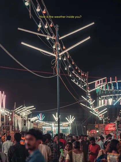 The chaotic yet beautiful lighting at a night fair. This photo captures the raw, makeshift energy of local festivals and events in India.