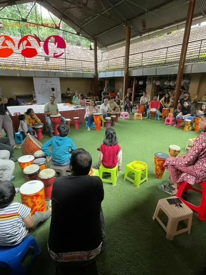 A high angle view of the circle, showing everyone participating. We create an inclusive environment where everyone's contribution matters.