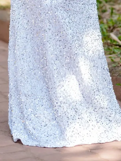 A detail shot of the shimmering sequin skirt.