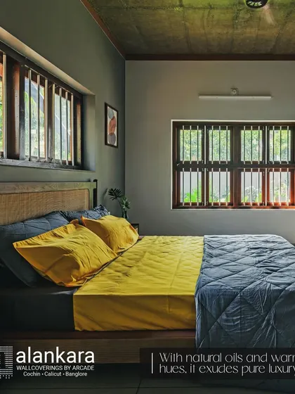 This custom bed frame features a headboard crafted from wood and natural cane, adding a touch of organic texture. The warm wood tones and contrasting bedding create a cozy and inviting atmosphere.
