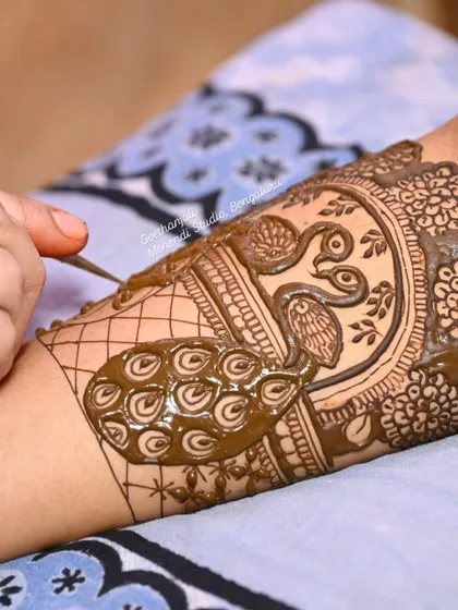 The art of filling. This shot shows how I build up a design layer by layer, a technique I teach to create depth and richness in patterns like this peacock motif.