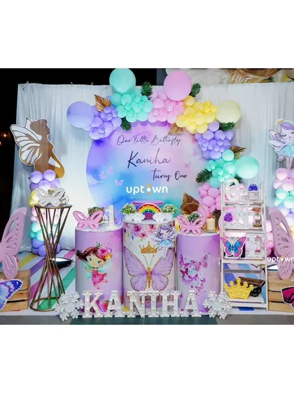 A beautiful pastel butterfly theme for Kanha's first birthday.