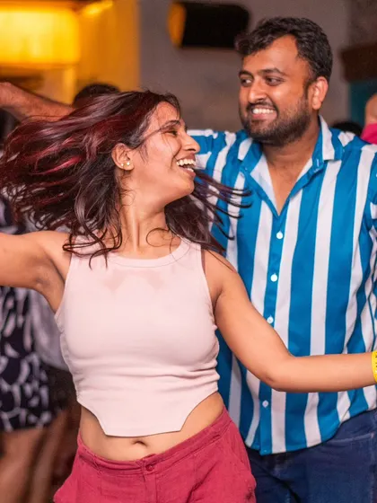 A dynamic spin with a huge smile.