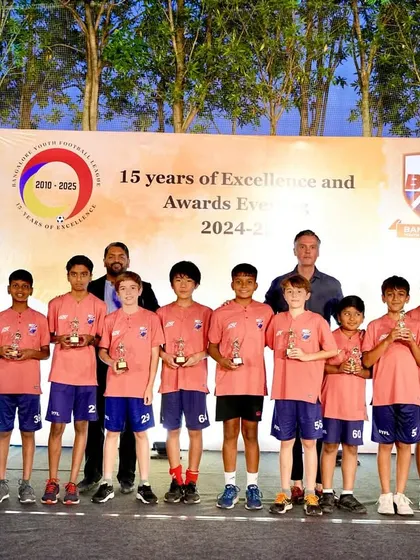 Our U13 team with their coaches and their awards for the season.