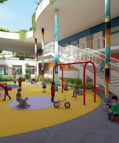 A closer view of the pre-primary courtyard at Hyderabad Public School. The space is designed to be safe, engaging, and scaled for young children, with playful equipment and colorful columns that inspire creativity and social development.