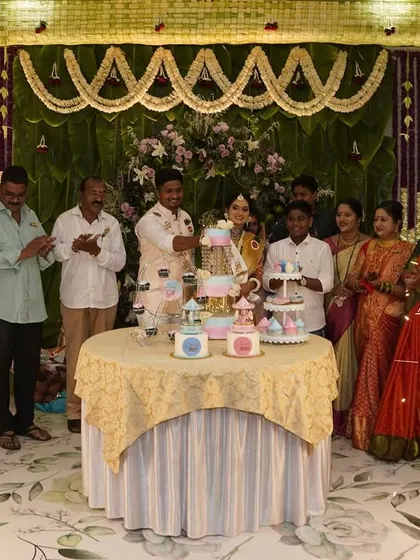 A joyous family moment at a baby shower, with our dessert table and sparklers adding to the celebration.