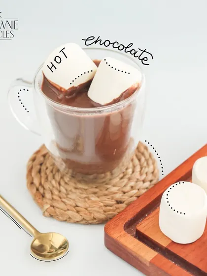 Our hot chocolate is even better with a couple of fluffy marshmallows on top. They melt into the rich chocolate, creating a sweet, gooey layer.