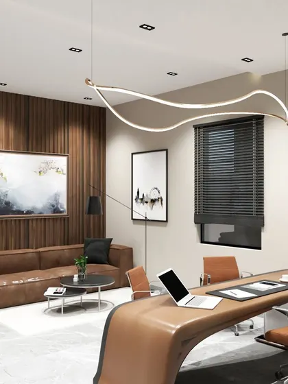 A closer look at the executive office concept, focusing on the seating area. This space is designed for private discussions, featuring a comfortable sofa against a wood-paneled wall and abstract art to add personality.