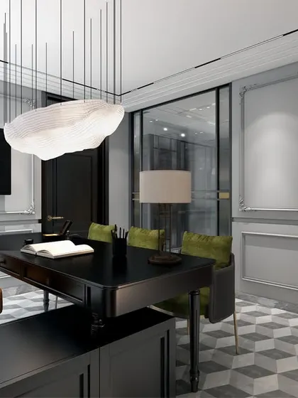A view focusing on the client-facing side of the desk, showing the elegant seating and the continuation of the classic wall molding. The space is designed to make clients feel comfortable and respected.