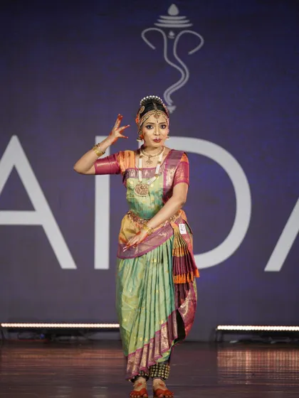 This dancer's elegant stance and focused expression are a testament to her training. She secured a 2nd place award in the senior category.
