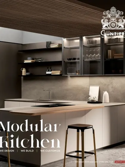 A modular kitchen doesn't have to be plain. This design features open shelving and glass-front cabinets, allowing you to display your favorite crockery while keeping everything organized.