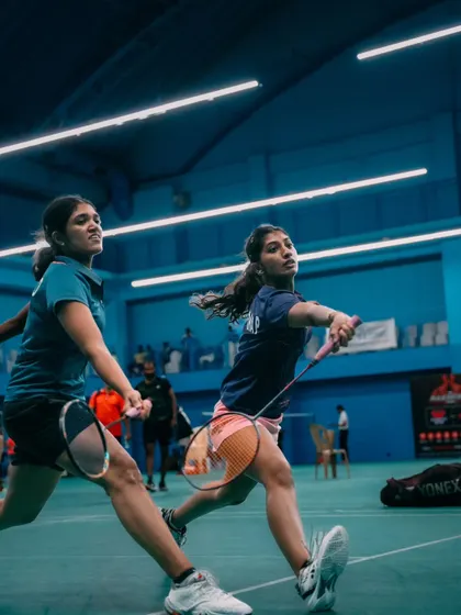 A women's doubles team in perfect sync, moving together to cover the court. Our events are a great platform for showcasing teamwork and coordination.