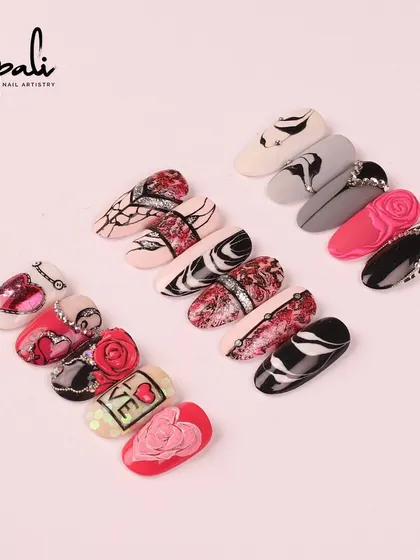 A collection of Valentine's Day inspired designs, featuring 3D roses, glitter, and crystal hearts. These are perfect for a romantic and glamorous look.