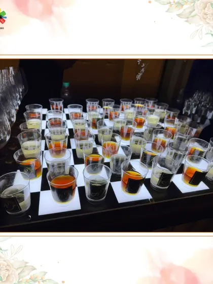 A visually stunning display of shots on a lit chessboard. This is an example of how we use creative presentation to make even simple drinks an exciting part of the event.