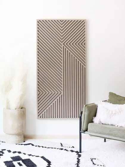 Displayed in a bright, airy room, the 'Ethnic Mirage' art stands as a beautiful, textural statement piece.