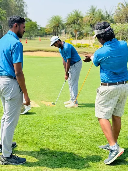 Our coaches are constantly on the range, providing hands-on instruction. From demonstrating a swing path to analyzing a student's setup, these moments of direct mentorship are where real progress is made.