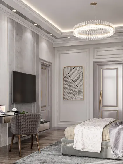 A functional and stylish bedroom corner with a built-in desk and TV unit, showcasing our ability to create multi-purpose spaces without compromising on design.