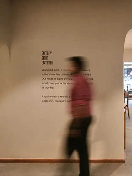 The brand story is subtly integrated into the wall, reinforcing the narrative of the space without overwhelming the senses.