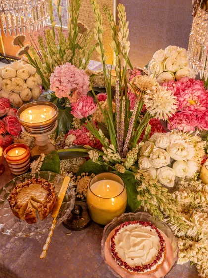 Decadent desserts, fragrant candles, and lush florals. This image from our 'Rituals' collaboration captures the essence of a truly magical Diwali celebration, where every detail is a treat for the senses.