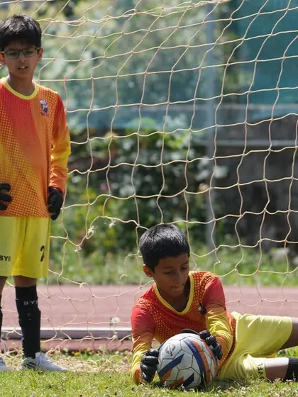 Our goalkeepers work together, learning from each other during training and matches.