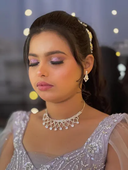 A close-up of the glittery purple eye makeup, perfect for a cocktail party or a sangeet night.