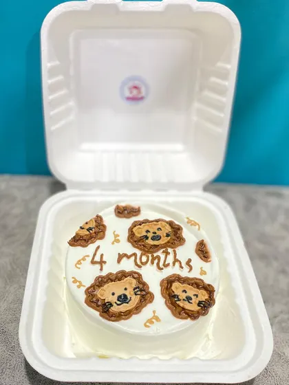 Our 4-month celebration bento cake, neatly packed and ready to go.