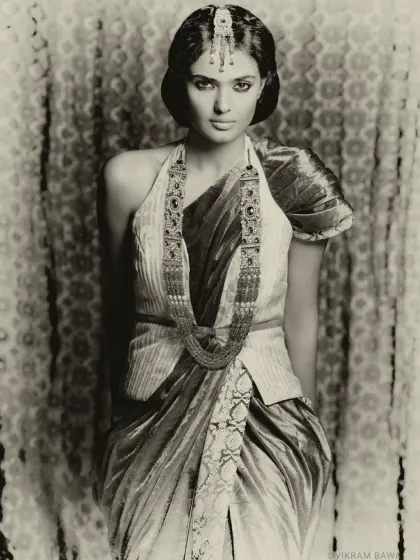 Where timeless beauty meets exquisite craftsmanship. Another sepia-toned shot for the TBZ campaign, blending traditional Indian attire with a vintage photographic style.