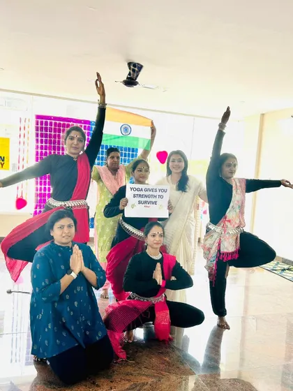 My students put on a beautiful performance for our Women's Day celebration. They combined graceful dance with powerful yoga poses, holding a sign that reads "Yoga Gives You Strength to Survive."