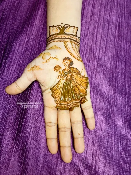 The initial outline of the Karwachauth figure, showing the start of the creative process.