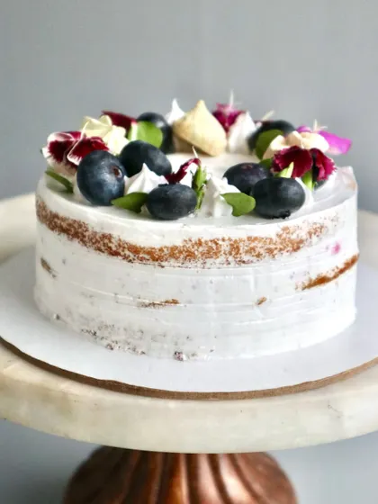 Simple, elegant, and bursting with flavor, my Blueberry Naked Cake is a real crowd-pleaser. I use a soft vanilla sponge and layer it with a homemade fresh blueberry compote and light whipped cream to let the natural sweetness of the berries shine.