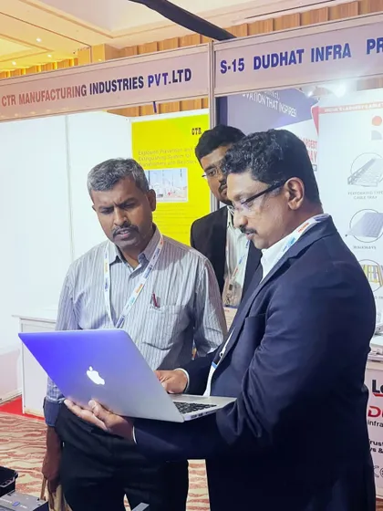 Using a laptop to demonstrate my energy management software to consultants at the IEEMA meet.