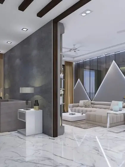 A wide shot of the living area, showing how a partial wall divides the space while maintaining an open feel.