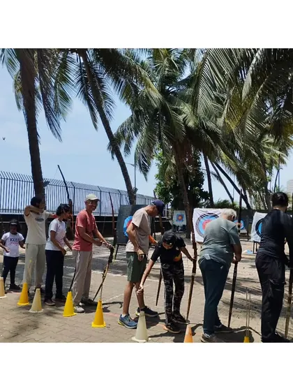 Students at our Dadar range, set against the scenic backdrop of the sea. Learning archery here is a truly unique experience.