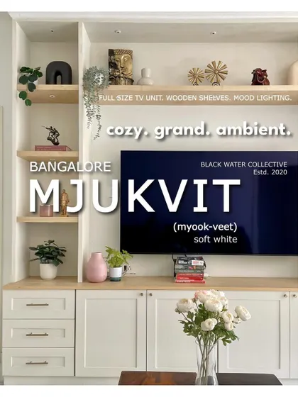 (2/3) The focal point of the Mjukvit residence, this full-size TV unit is cozy, grand, and ambient, with light oak wood shelves and mood lighting.
