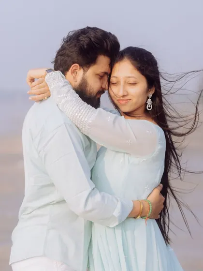 A quiet, windswept moment during a pre-wedding shoot on the beach. I focus on creating a comfortable space where couples can be themselves, resulting in genuine and emotional portraits like this.