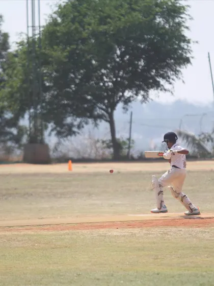 An action shot of Lithik Reddy during his century-scoring innings, showcasing his excellent batting technique.