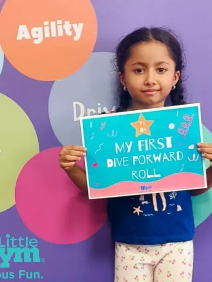 She did it. Mastering a new skill like the dive forward roll is a big deal, and we make sure to celebrate it. These moments of success are what build a foundation of confidence.